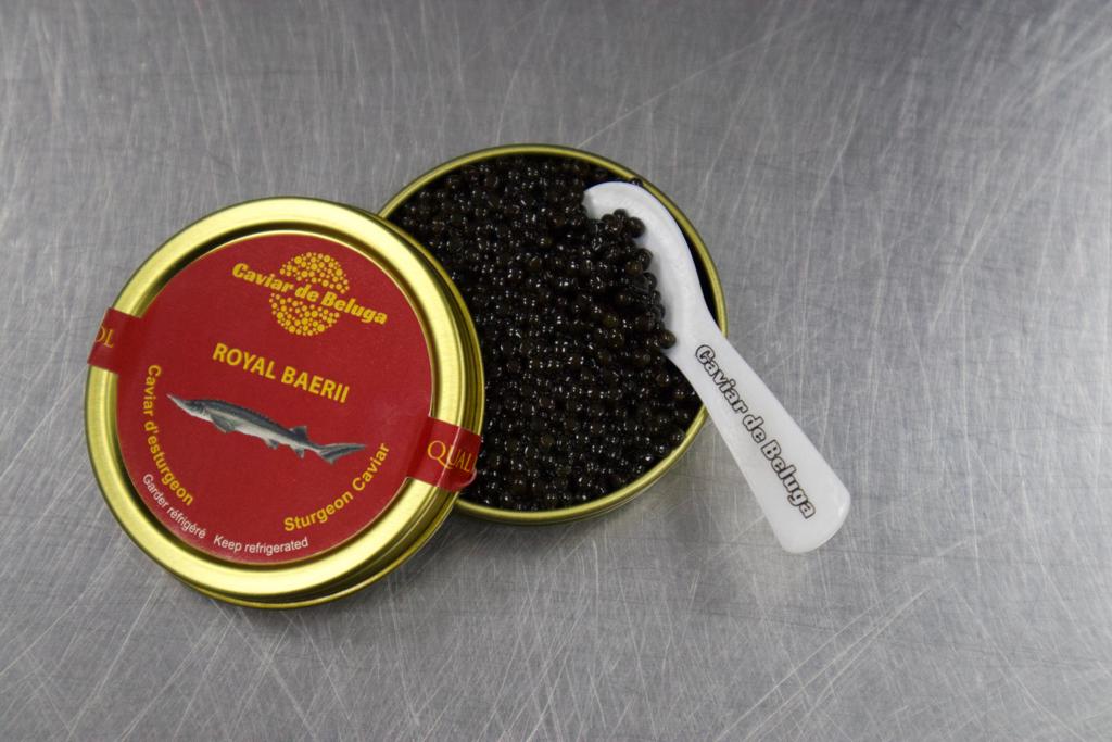 Caviar de Beluga Royal Baerii tin open — elegant dark pearls with smooth mild flavour